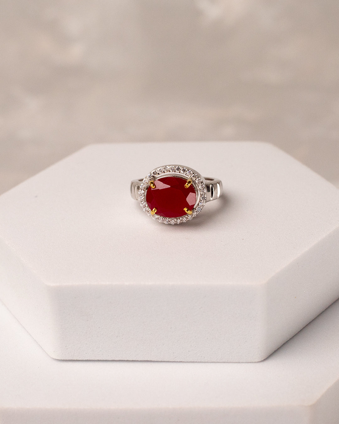 Oval Ruby Crescent Halo Ring