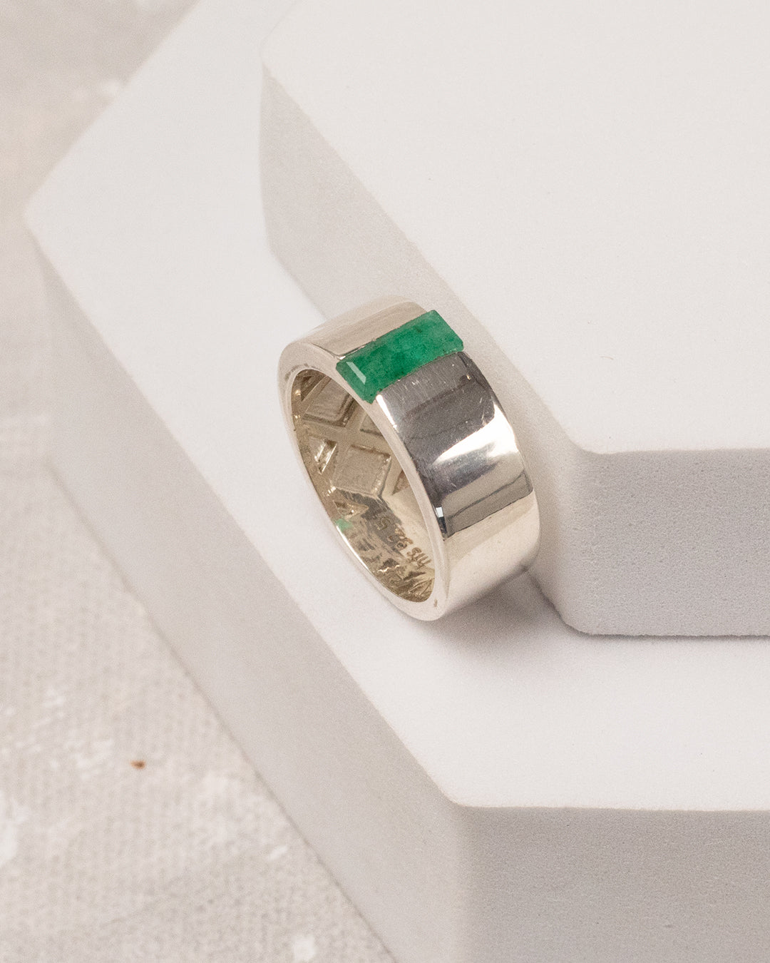 Wide Band Flush-Set Emerald Ring