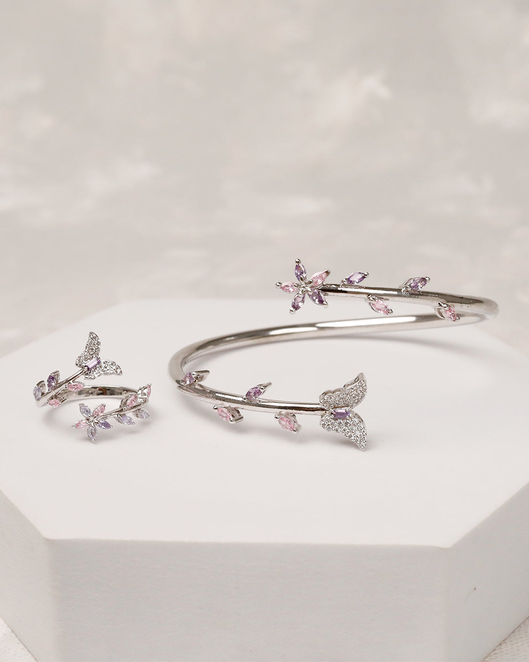Silver bracelet with pink gemstones